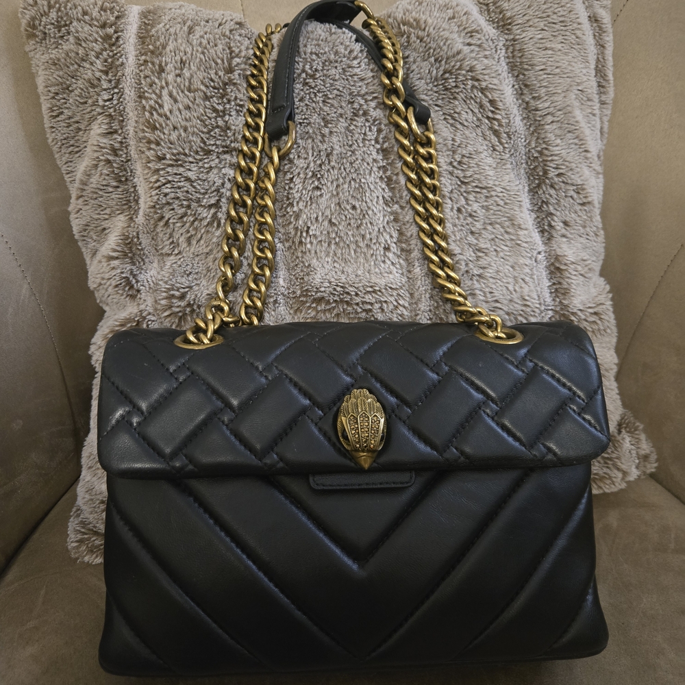 Elegant Black Quilted Handbag with Gold Chain